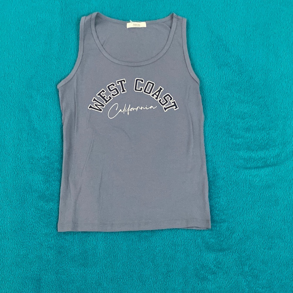 This is acute Tank Top from Active USA. This is a girls medium.